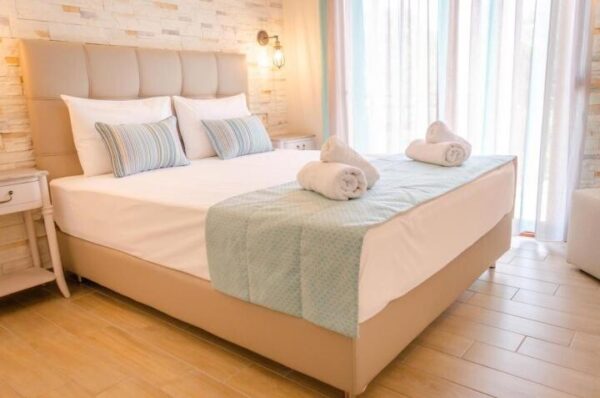 Palm Studios Limenas, Tasos leto * Fun Travel Agency